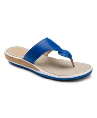 A more polished take on the classic flip flop. The Jaquelle sandals by Rockport feature a beautiful slide silhouette in leather with a logo footbed and sleek cork wedge.