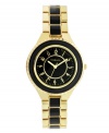 Decadent design for everyday elegance. Watch by Style&co. crafted of black and gold tone mixed metal bracelet and round gold tone case with black bezel. Glossy black dial features applied gold tone numerals, minute track, three hands and logo. Quartz movement. Splash resistant. Two-year limited warranty.