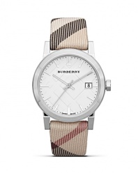 Freshen up your face with this stainless steel watch from Burberry, accented by a check stamped dial. With Swiss movement and a slim profile, this understated style is a functional day-to-day choice.