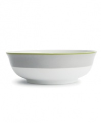 Stripes of gray and green trim this versatile serving bowl, a stylish complement to the bold graphic blooms of Floral Fan dinnerware by Echo Design.