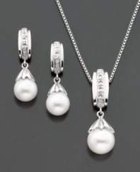 The perfect pairing. This matching set features a graceful pendant and pair of stud earrings that highlight a cultured freshwater pearl (7-8 mm) with round-cut diamond accents for a classic touch. Set in sterling silver. Approximate chain length: 18 inches. Approximate pendant drop: 1/2 inch.