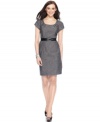 AGB updated a classic sheath silhouette with a modern belted waist. Gathering at the neckline adds an elegant flourish!