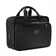 When a meeting turns into an overnight trip, this expandable Briggs & Riley rolling briefcase helps you roll with the punches. The @Work boasts three sections: an organizer section, a removable sleeve that fits most 15.4 laptops and a divided fan file section that accommodates letter and legal size folders -- plus a change of clothes with a garment securing panel. Laptop sleeve can be tethered to the bag at security screenings reducing risk of damage or loss. Front organizer has multiple pockets, including padded pockets for gadgets. Coal chute holds a laptop power supply. Interlocking handle system allows for multiple bag stacking.