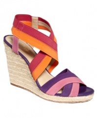 Bring cabana-inspired style to every day. The Idyll sandals by Enzo Angiolini have good looks wrapped up with their colorblocked straps and woven espadrille wedge.