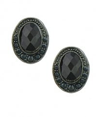 Featuring a combination of jet crystals and Czech stones, 2028's oval button earrings convey vintage-inspired elegance. Crafted in hematite tone mixed metal. Approximate diameter: 3/4 inch.