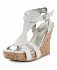 A neutral that will most certainly get noticed. The Priela sandals by GUESS feature a luxe leather silhouette atop an earthy cork wedge for leg-lengthening appeal.