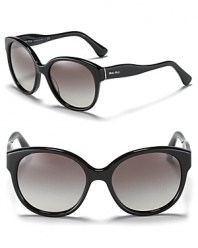 Make waves in these round oversized sunglasses with curvy temples. By Miu Miu.