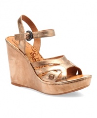Go for the gold! Metallic leather adds a spicy element to the Pasha wedge sandals by Born. With a high wedge heel, their adjustable ankle strap offers extra support.