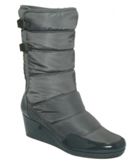 Wrap up tight and keep your cool. The Pamelia boots by Calvin Klein beat the cold with a double clasp closure and puffy nylon construction. Patent trim and covered wedge sweeten the deal.