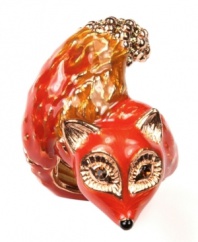 Foxy and fashionable! RACHEL Rachel Roy's stretch cocktail ring features an eye-catching fox design. Crafted in rose gold tone mixed metal, it's embellished with glittering glass accents. Ring adjusts to fit finger.