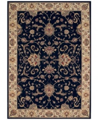 Evoking the strong look of ancient Sarouk rug designs, the Premier area rug from Dalyn is woven with intricate floral medallions in rich black. Made in Egypt of durable polypropylene and shimmering polyester fibers, it provides any room with captivating texture and added dimension.