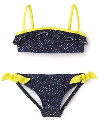 Every visit to the pool or the beach becomes a party with this confetti-print swim set featuring multicolored dots and sunny yellow contrast straps and bows.