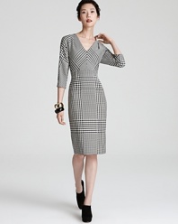 Classic houndstooth takes on a flattering feminine silhouette in this office-perfect Escada dress.