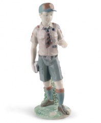 Lladro salutes the Boy Scouts of America with this collectible figurine honoring the program's 100th anniversary. Crafted in fine porcelain with the traditional Scouts uniform and universal emblem, it's a meaningful keepsake for boys of all ages.