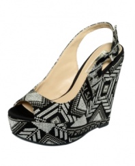 Pump up your look with a sexy slingback in a funky, ethnic print. INC international Concepts Robin platform wedges add so much to your look. Pair it with bright, solid colors and watch the pattern pop.