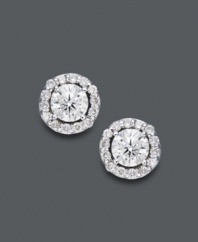 Style fit for a star. Wear this sparkling pair for any occasion, but be prepared to turn heads. Round-cut diamonds (1 ct. t.w.) shine amongst a halo of diamond accents. Crafted in 14k white gold. Approximate diameter: 7-1/2 mm.