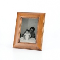 With rustic style and natural grain variation, this classic wood Prinz frame brings warmth to any decor.