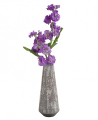 Back to basics. The Toya vase from Design Ideas has the look of stone in textured gray ceramic, offering chic contrast to delicate blooms.