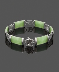 The perfect look to complement your unique style. This beautifully-crafted bracelet highlights rectangular jade links (9 mm x 18 mm) set in polished, sterling silver cut-out symbols. Approximate diameter: 2-3/4 inches.