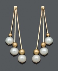 The best of both worlds -- these Belle de Mer earrings combine traditional pearls with bold style. Set in 14k gold, three graduated drops feature cultured freshwater pearls (6-7 mm) and gold bead accents. Approximate drop: 1-3/4 inches.
