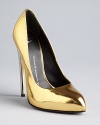 Shine in sky-high liquid gold pumps that are pure luxe from gleaming pointed toe to metallic heel; by Giuseppe Zanotti.