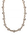 Adorned with a dazzling array of smokey quartz-hued crystals, Givenchy's collar necklace will be a chic complement to your fall wardrobe. Crafted in gold tone mixed metal. Approximate length: 16 inches.