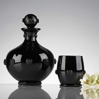 Chic Black drinkware from Juliska. Juliska glass is mouth-blown by artisans in the hills outside Prague. The techniquest they use have been passed down through generations. Being handmade, no two pieces of Juliska are identical. Each has its own exquisite, individual character. Every piece of Juliska glass is individually signed as a hallmark of its origin and authenticity.