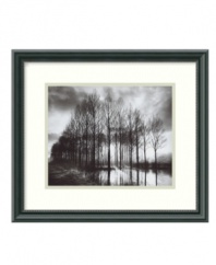 Framed, matted and captured in classic black and white, Bill Phillip's Trees in Normandy art print fills your home with the serene stillness of winter.