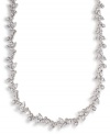 Add a hint of glitter to your neckline for an extra special touch. Carolee necklace features a floral design crafted in sparkling clear crystals. Set in mixed metal. Approximate length: 16 inches + 2-inch extender.