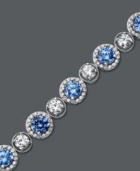 Perfect your party look with plenty of shine. Arabella's glamorous tennis bracelet combines round-cut blue and white Swarovski zirconias (22-9/10 ct. t.w.) for a look that's completely brilliant. Crafted in sterling silver. Approximate length: 7 inches.