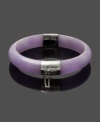 Make your look pop with fresh, pastel color. Bangle is crafted from solid jade dyed in a pretty lavender shade  (10-13-1/2 mm) with sterling silver accents. Approximate diameter: 2-4/10 inches.