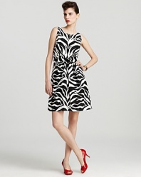 Pairing a classic silhouette with a fierce zebra print, this kate spade new york sheath unleashes modern femininity.