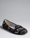 Two trends in one, these Charles Philip slip ons pair the smoking flat silhouette with fashionable tribal uppers.