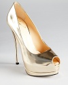 In metallic, mirrored leather, Giuseppe Zanotti's sky-high Sharon pumps shine on with a towering 5.5 heel.