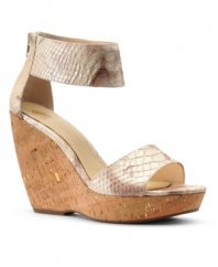 The Isola Oasis Wedge Sandals provide an exotic break from the everyday with their slinky snake straps, closed ankle and shapely cork wedge.