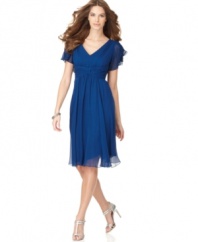 Crafted in gauzy chiffon, this Suzi Chin dress is an effortlessly chic look that flatters your figure.