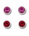 Bright idea: Add a playful pop of color to your look with Swarovski's stylish set of vibrant crystal stud earrings. Featuring colored crystals in fuchsia and red, they're set in silver tone mixed metal. Approximate diameter: 2/10 inch.