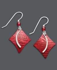 Artistic appeal. Jody Coyote's unique design lends a look of free-spiritedness with red patina brass drops accented by red crystal beads. Set in sterling silver. Approximate drop: 1-1/2 inches.
