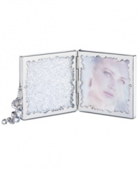 Make your memories shine even brighter with the travel-perfect Crystalline picture frame. A hinged design with a built-in mirror, Swarovski crystal chatons and a beaded tassel accent add new beauty to treasured moments.