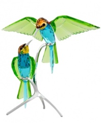 Birds of a feather. Perched on silvertone metal branches, the Swarovski Bee-eaters are a beautiful sight, intricately crafted from approximately thirty separate pieces and with wings of sparkling peridot crystal.