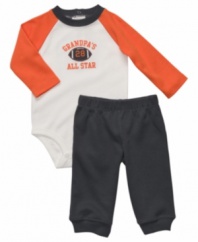 Your baby boy will be outfitted for terrific tailgate parties this season with this football-themed two-piece set from Carter's.