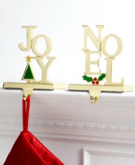 Hang Christmas stockings in the spirit of the season with goldtone metal Joy and Noel hooks for the mantel. With colorful tree or holly detail. (Clearance)