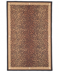 Sleek and exotic, the Chelsea Leopard rug from Safavieh is a surprisingly versatile addition to your decor. Hand-tufted of fine wool for softness and detail, the rug adds a stylish boost to any room. (Clearance)