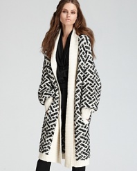 Layer on luxe style with this cozy, oversized Rachel Zoe cardigan in a classic jacquard check.