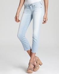Faded railroad stripes bring vintage edge to these True Religion cropped skinny jeans.
