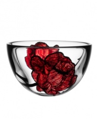 Inked with big red roses in eco-friendly paint, the handcrafted Tattoo bowl features beautiful art glass with a cool rock n' roll edge. Designed by Ludvig Lofgren for Kosta Boda.