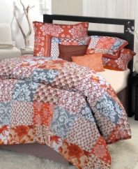 A vibrant palette of orange, red, grey and white illuminates your room in this Moroccan-inspired comforter set. Features a distinctive patchwork style pattern where squares display different floral designs. Two solid-colored decorative pillows tie together this look that's full of life.