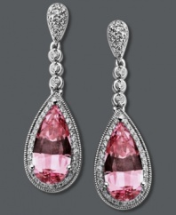 Pretty in pink. Add a sweet touch of femininity in Arabella's dazzling drop earrings. Crafted from pear-cut pink Swarovski zirconias (10-5/8 ct. t.w.), and sparkling clear zirconias (1 ct. t.w.) set in sterling silver. Approximate drop: 1-1/4 inches.