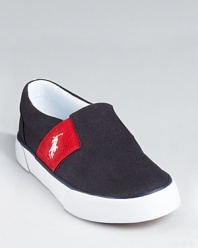 Ralph Lauren Childrenswear's Gavin slip-on updates a classic with contrast side stripes with embroidered pony logo.