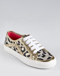 High-energy shoes for your wild child, these lace-up sneakers feature a leopard print, gold metallic trim and contrast red interior.